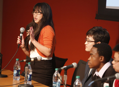 Lynn Wang and a panel of fellow students describe what they have learned in USC’s summer high school programs in stem cell research at a forum held in the Aresty Auditorium on July 12. Photo/Steve Cohn