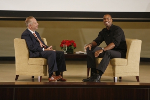 During the first of the Dean’s Distinguished Lecture series, Keck School of Medicine Dean Carmen A. Puliafito, MD, MBA, interviews NBA player Jason Collins on his coming out as an openly gay athlete. (Photo/Steve Cohn)