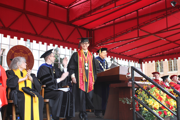 Valedictorian Alexander Yuen was introduced by University President C.L. Max Nikias during the main commencement ceremony in Alumni Park.