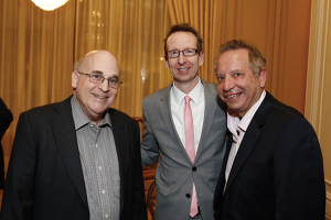 From left, Paul Aisen, Michael Quick and Carmen A. Puliafito pose during the USC Alzheimer's Therapeutic Research Institute Partnership Meeting in January. (Photo/Steve Cohn)