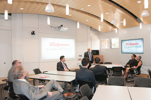 The state-of-the-art conference and learning center features an interactive smart board, multiple large video screens, wireless-enabled workshop stations with modular seating, and audio/videoconferencing capability among many other features.