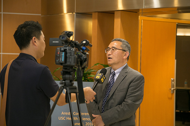 Jae Jung is interviewed during the Zika Virus Awareness Symposium, held June 9 at Aresty Auditorium on the Health Sciences Campus. (Photo/Ricardo Carrasco III)