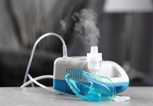 A nebulizer releases vapor.