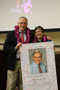  Mikel Snow, PhD, and his wife celebrate at a special ceremony in Mayer Auditorium.  (Photo/Amy E. Hamaker)