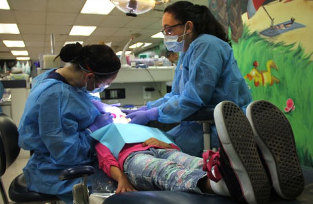 Taking a seat in the dentist's chair can be traumatic for children with autism. (Photo/Beth Newcomb)