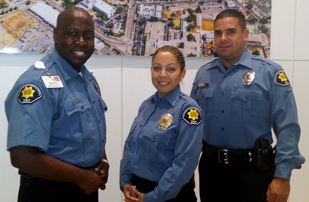 Community Service Officers Michael Dunn, Jenny Granados, Steven Cuarenta show off their new uniforms.