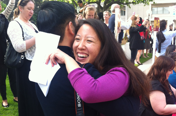 Kristie Wang celebrates with friend Henry Chu after opening her Match Day letter.