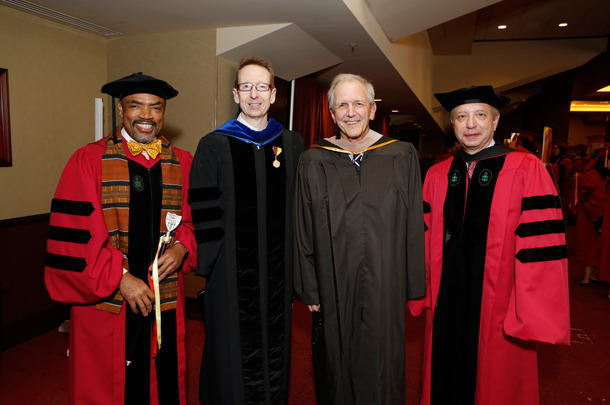 Vice Dean Henri Ford, Provost Michael Quick, commencement speaker Charles Gibson and Dean Carmen A. Puliafito. 