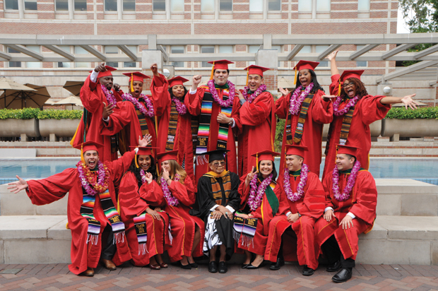 Dean of Diversity Affairs Althea Alexander and new MD recipients celebrate after the May 16 commencement.