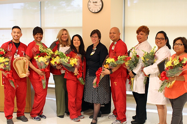 Winners during the 2015 Nursing Recognition Awards celebrate May 6 with Chief Nursing Officer Annette Sy. From left, Nurse Rookie Jerwyn Tiu, Nurse Preceptor Stephanie Johnson, Advanced Practice Nurse Kathrine Winnie, Nurse Leader  Lori Hitomi, Sy, Nurse of the Year  Victor Dimicali, Nurse Humanitarian Lisa Johnson, Nurse Advocate Maria Victoria Deras and Care Partner Leonore Rodriguez. 