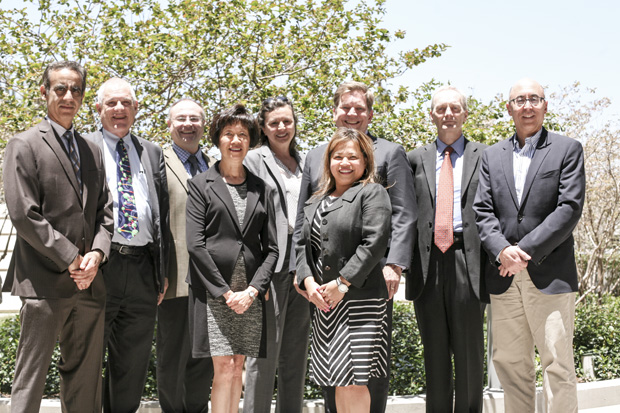 USC Norris medical leaders joined other faculty and staff in June to finalize preparations for the NCI site review. From left, Preet Chaudhary, Stuart Siegel, Heinz-Josef Lenz, Amy S. Lee, Roxana E. Bellia, Stephen B. Gruber, Janet L. Villarmia, Graham Casey and Alan S. Wayne.