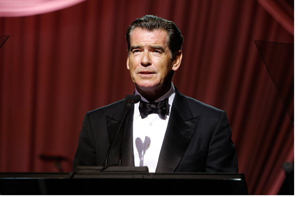 Actor Pierce Brosnan shares a personal story during the USC Norris Comprehensive Cancer Center Gala.