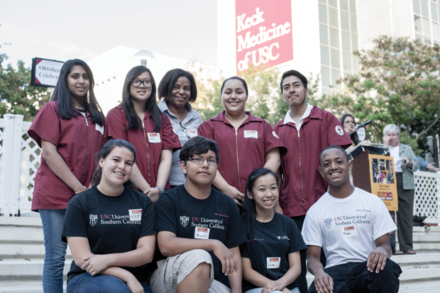 Med-COR Director Joyce Richey, back row center, introduced students from the program during the annual Oktoberfest event presented by the Keck School of Medicine of USC.