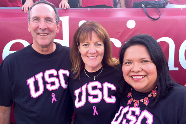 Physicians Stephen F. Sener and Christy A. Russell with cancer survivor Ghecemy Lopez, who serves as project specialist for USC Government Relations.