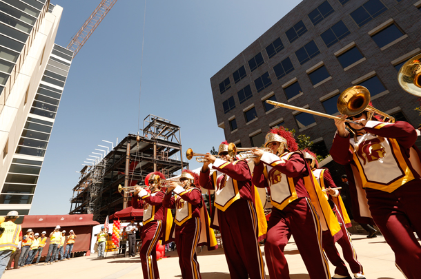  The signing event featured an appearance by the Trojan Marching Band to help mark a milestone in ongoing construction at HSC.