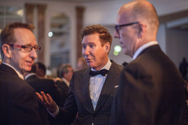 USC Provost Michael Quick talks with broadcast media medical expert Lawrence Piro and Tom Jackiewiz, senior vice president and CEO of Keck Medicine of USC. 