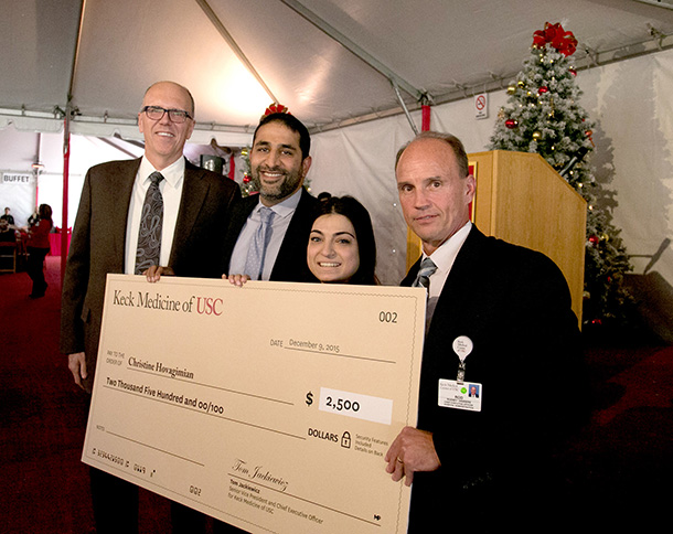 Christine Hovagimian, second from right, was named 2015 Keck Medicine of USC Employee of the Year. Shown with her, from left, are Keck Medicine of USC leaders Tom Jackiewicz, Amar Desai and Rod Hanners.