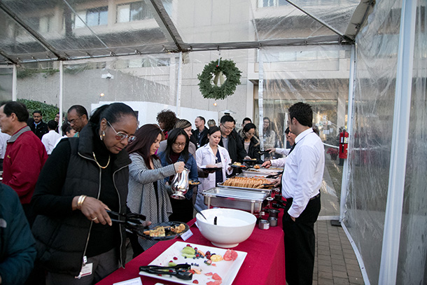 Hundreds of employees from the Keck School of Medicine of USC and the USC School of Pharmacy attended the annual holiday breakfast on Dec. 18, 2015, hosted by Keck School Dean Carmen A. Puliafito, MD, MBA, and Interim Dean Glen L. Stimmel, PharmD, of the USC School of Pharmacy. (Photo/Ricardo Carrasco III)