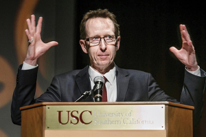 USC Provost Michael Quick welcomes the crowd to Something’s Not Right With Alice: Understanding Alzheimer’s. Quick described the disease as one of the “wicked problems” of our time. (USC Photo/David Sprague)