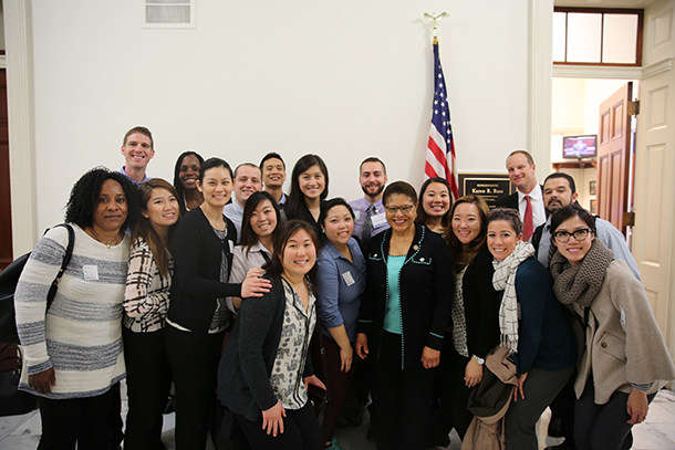 Students pose with Congresswoman Karen Bass, an alumni of the Primary Care Physician Assistant Program at the Keck School of Medicine of USC, in front of her office on Capitol Hill.
