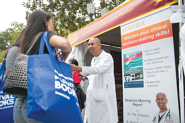 Raj Dasgupta, MD, talks to attendees April 9, 2016, at the Los Angeles Times Festival of Books on the University Park Campus.