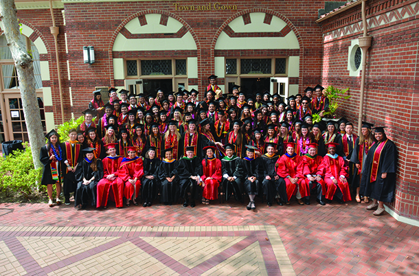 Graduates from the Keck School of Medicine of USC's Health Promotion and Global Health programs take a class photo after commencement May 13, 2016 at Town and Gown on the University Park Campus.