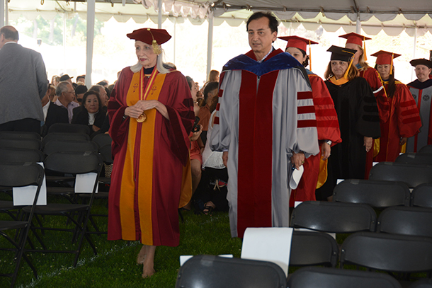 Florence Clark, PhD, associate dean and chair of the USC Mrs. T.H. Chan Division of Occupational Science and Occupational Therapy, and commencement speaker Fariborz Maseeh, ScD, lead the procession during the satellite commencement ceremony May 13 on the University Park Campus.