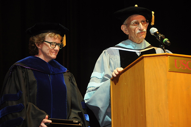 James Gordon, EdD, PT, associate dean and chair of the Division of Biokinesiology and Physical Therapy, introduces Sharon L. Dunn, PT, PhD, president of the American Physical Therapy Association, left, as the commencement speaker for the division's satellite commencement ceremony May 13 on the University Park Campus.