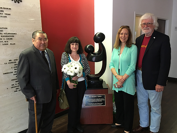 Eiming Djang, DAISY Award winner Ellen Day and Bonnie and Mark Barnes, founders of the DAISY Foundation, are seen with USC Verdugo Hills Hospital’s newly installed DAISY statue, May 11, 2016.