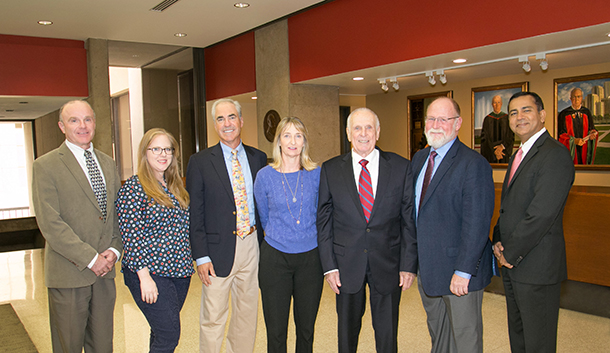 From left, Tom Buchanan, Martha E. Haake, James Russell, Jane Haake Russell, Richard Haake, Donald Haake and Rohit Varma are seen May 9 on the Health Sciences Campus. Directors of the Donald E. and Delia B. Baxter Foundation visited the campus to hear presentations from Keck School of Medicine of USC faculty and meet with participants in the Baxter Foundation Student Research Fellowship Program.