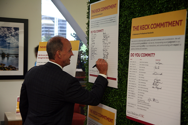 Rod Hanners, chief operating officer of Keck Medicine of USC, signs the Keck Commitment, June 21, 2016 at Keck Hospital. The Keck Commitment is a statement of professional standards for Keck Medicine of USC that is a promise to promote and protect professionalism in the workplace. The commitment is made of three pillars: excellence, judgment and respect.