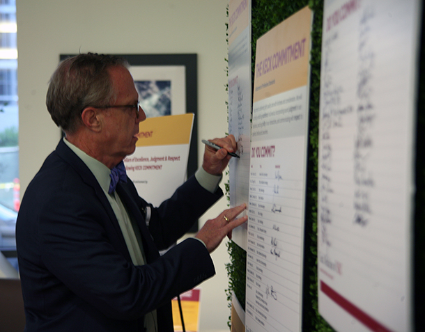 Paul Craig, chief administrative officer for Keck Medicine of USC, signs the Keck Commitment, June 21, 2016 at Keck Hospital.