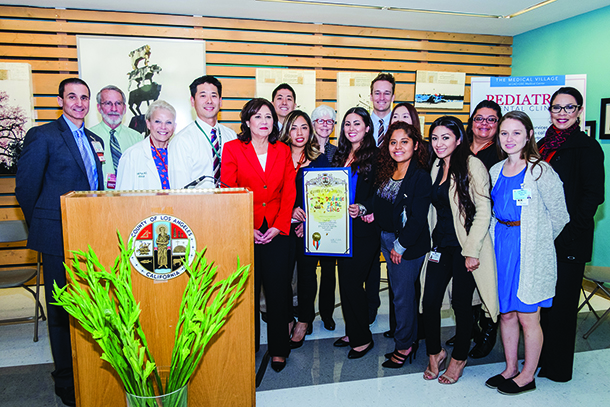 Officials from the Herman Ostrow School of Dentistry of USC are joined by members of the Violence Intervention Program (VIP) and the office of Los Angeles County First District Supervisor Hilda Solis. The partnership members have opened the Pediatric Dental Clinic (PDC) in the Village at LAC+USC Medical Center.