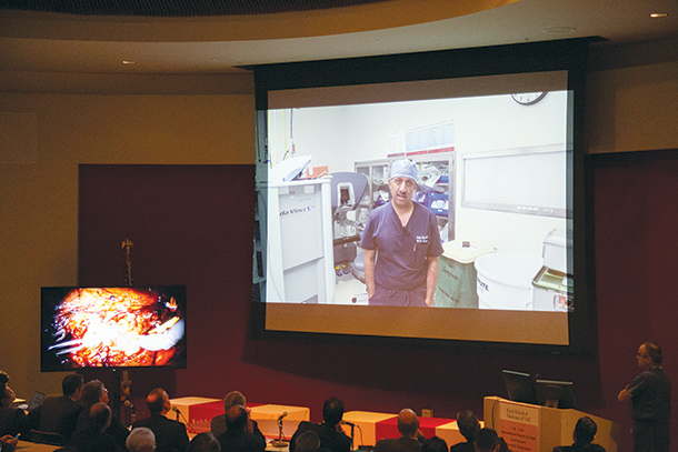 Inderbir Gill speaks during a live surgery symposium.