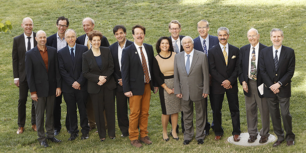Speakers and session chairpersons stand with Berislav Zlokovic, eighth from left, and Selim Zilkha, fifth from right, during the third annual Zilkha Symposium on Alzheimer Disease and Related Disorders, held April 15 on the Health Sciences Campus.