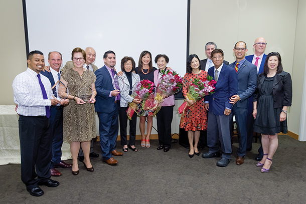 Members of the Choi Family along with Tom Jackiewicz, CEO of Keck Medicine of USC, Rod Hanners, CEO of Keck Medical Center of USC and COO of Keck Medicine,  celebrate with winners of the inaugural Choi Family Awards during a recent ceremony at USC Norris.