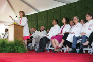 First-year students, family and faculty attend the 2016 white coat ceremony Aug. 12 on the Broad Lawn at the Health Sciences Campus.