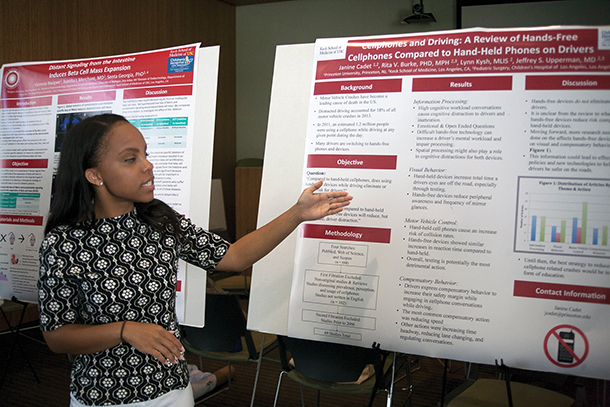 Janine Cadet speaks during the sixth annual Bridging the Gaps Summer Research Poster Day on Aug. 4 in the Broad CIRM Center.