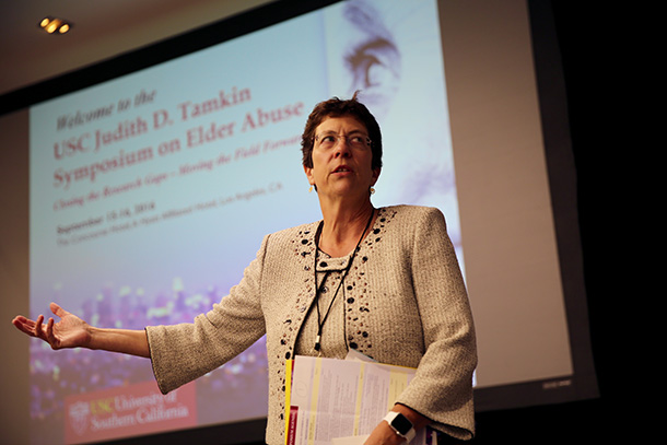Laura Mosqueda, the chair of the Department of Family Medicine at the Keck School of Medicine of USC, welcomes participants to the first annual USC Judith D. Tamkin International Symposium on Elder Abuse. (Photo/Claire Norman)