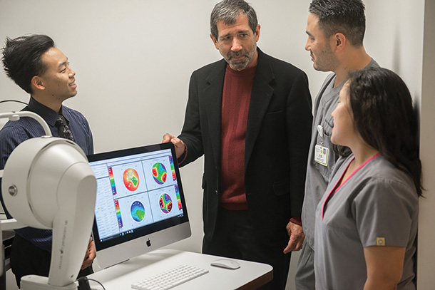 Joseph Cocozza, second from left, is leading the establishment of an ophthalmic technician training program at the USC Gayle and Edward Roski Eye Institute. Pictured with him are Ray Yamamoto, left; Ryan Imagiire, second from right; and Liz Capati, right.