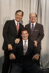 From left, David Lee, Terence Sanger (seated) and USC President C. L. Max Nikias smile during the installation of the David L. Lee and Simon Ramo Chair in Health Science and Technology, held Sept. 29 at the Broad CIRM Center Auditorium.