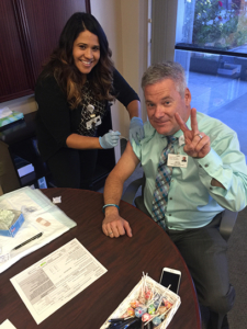 USC Verdugo Hills Hospital CEO Keith Hobbs receives the flu vaccine in September. (Photo/Courtesy Katrina Garcia)