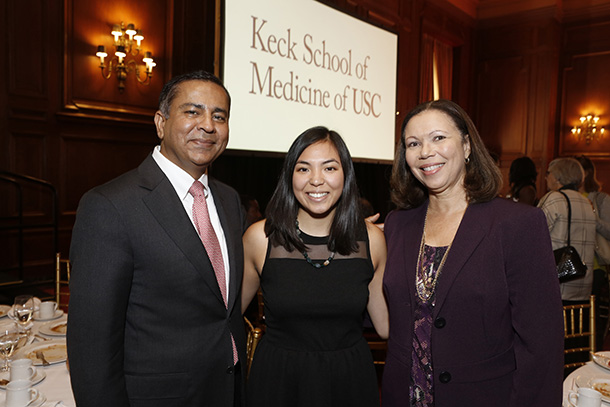 From left, Keck School of Medicine of USC Interim Dean Rohit Varma, third-year medical student Amy Komure and Senior Associate Dean Donna Elliott are seen Oct. 19 at the Keck School’s 11th annual Scholarship Luncheon in downtown Los Angeles.