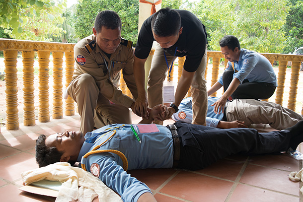 A Cambodian police officer receives basic emergency services training in Cambodia.