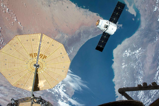 The SpaceX Dragon spacecraft nears the International Space Station. 
