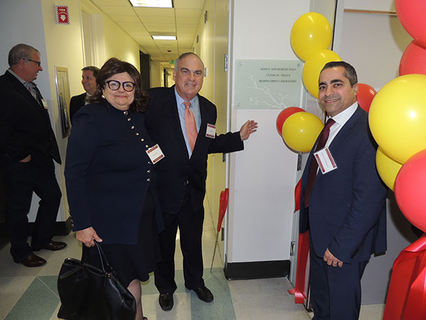 From left, Janice and Bob Hall and Anthony El-Khoueiry open the Janice and Robert Hall Clinical Trials Biospecimen Laboratory at USC Norris Comprehensive Cancer Center.