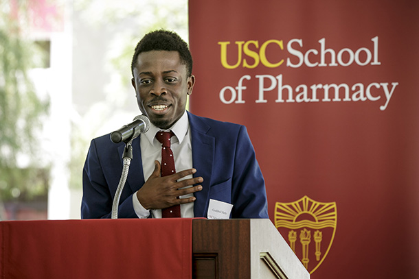 First year pharmacy student Godfred Marfo speaks at the USC School of Pharmacy Scholarship luncheon, held March 30.
