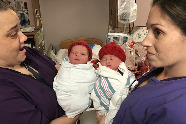 Baby boy Abbott, left, and baby girl Sosa, right, don their hand-knitted red caps at USC Verdugo Hills Hospital in February.