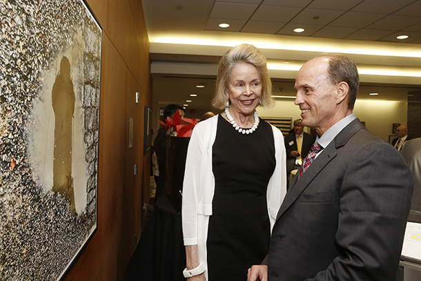 Katherine Keck discusses a photo with Rod Hanners during a reception for her artwork held April 6 at Keck Hospital.

4/6/17
Los Angeles, CA
Keck Hospital of USC
Photo by: Steve Cohn
www.stevecohnphotography.com
(310) 277-2054
© 2017