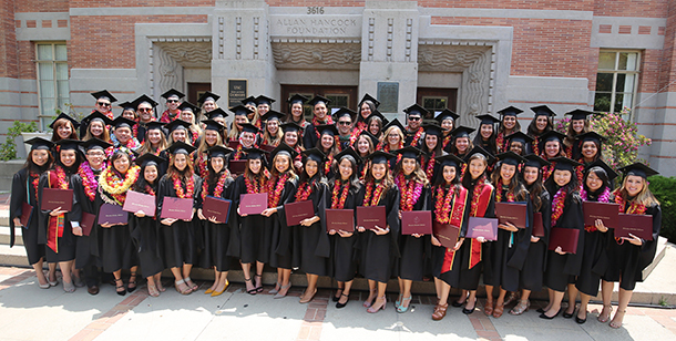 The Primary Care Physician Assistant Program Class of 2017 poses with their diplomas after the commencement ceremony on May 12.